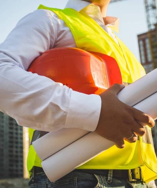 man-in-shirt-and-jacket-holding-hardhat-and-bluepr-2023-11-27-04-52-40-utc-2